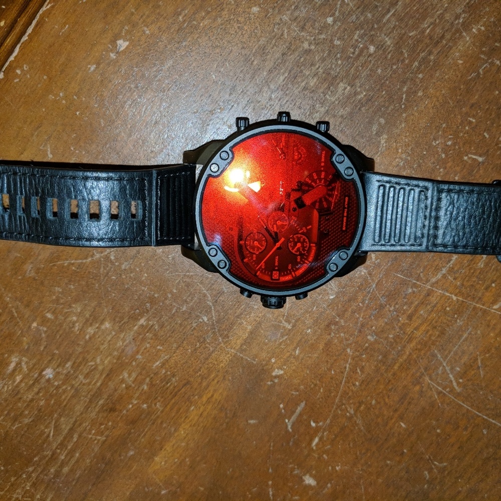 Red deisel watch lightly worn. Looks big on wrist